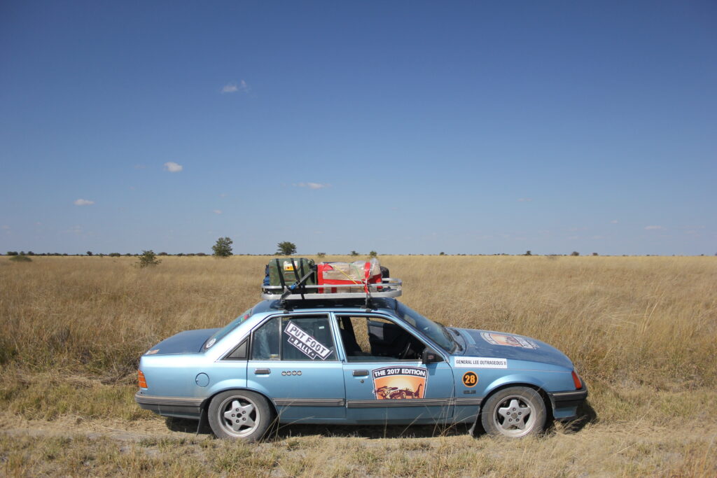 Spotty parked in the Botswana grasslands